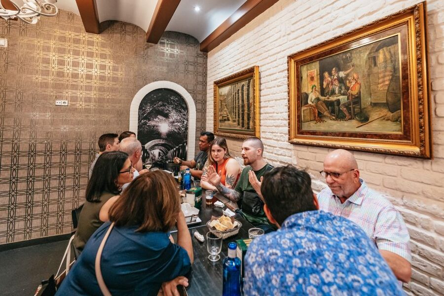 Madrid: Food & Wine Tour with 10 Tapas & 4 Drinks Included - Stop four: a century-old bodega and the final round