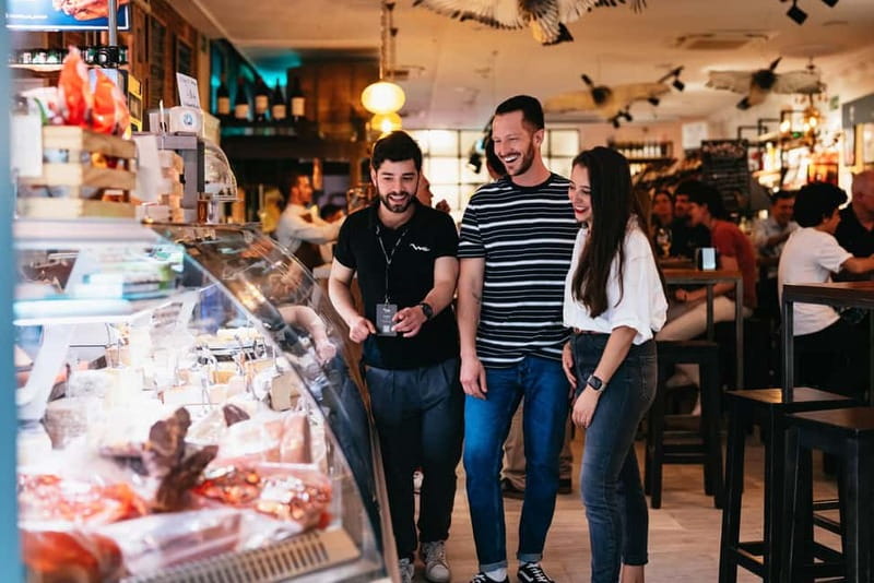 Madrid: Guided Tapas and Wine Tour with Rooftop Views - Barrio de las Letras and the beef cheek course