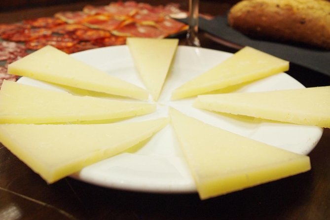Madrid Local's Wine and Tapas Lunch Tour with a side of History - Who will enjoy this Madrid food walk?