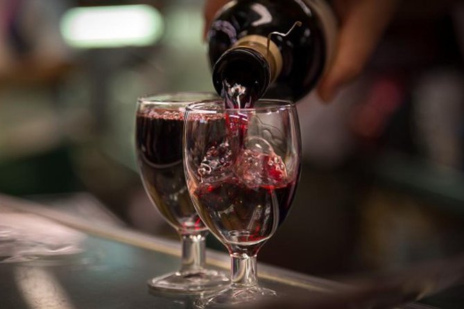 Madrid Local's Wine and Tapas Lunch Tour with a side of History - Walking through Madrid’s old center