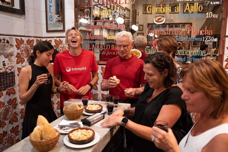 Madrid: Local Tapas, Drinks, and Hidden Gems Walking Tour - Shrimp, wine, and the final dessert