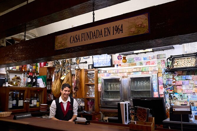 Madrid: Not Just Another Tapas & Wine Tour by Eating Europe - Puerta del Sol and Plaza Mayor between bites