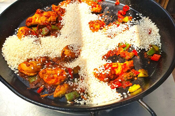 Madrid: Paella & Sangria Classes- Seafood, Chicken & Vegan option - The rice question: paella texture and timing