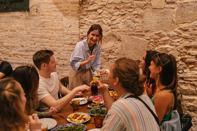 Madrid: Private Tapas & Wine Food Walking Tour in La Latina - Calle de Toledo and the black calamari sandwich