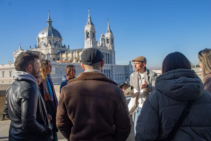 Madrid's Iconic Tapas, Taverns & History Experience - The first tavern and the Royal Quarter