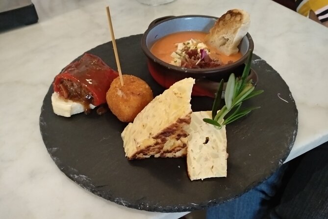 Madrid Small Group Tapas Tour at 4 Venues -Lunch or Dinner - The old-town food court and the wider Spanish menu