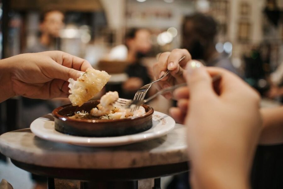 Madrid: Spanish Tapas Tour - Meeting the guide near Calderón de la Barca