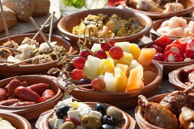 Madrid Tapas and Mysteries Walking Tour with Private Option - Three tapas bars, three drinks, and shared plates
