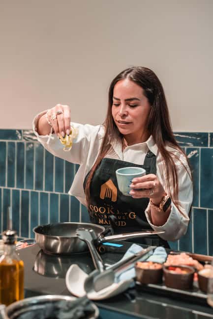 Madrid: Tapas Cooking Class with bottomless Wine Pairing - Making five traditional tapas with a professional chef