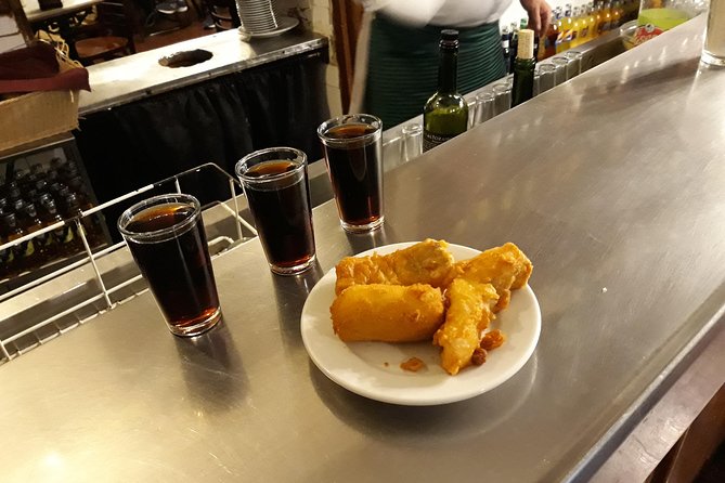 Madrid Tapas & Drinks: A Small Group Culinary Adventure - Puerta del Sol and Calle Mayor between bites