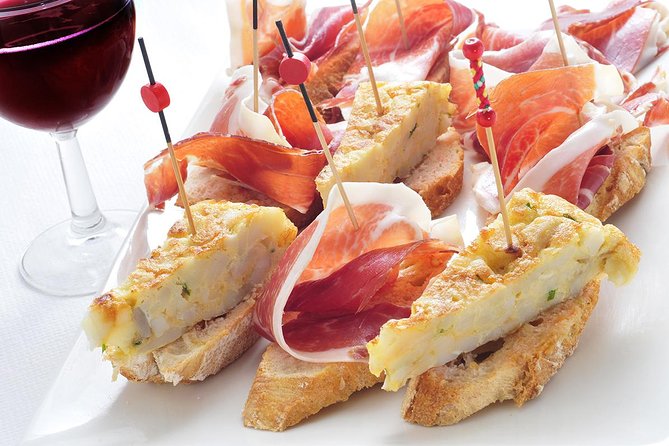 Madrid Tapas Experience Walking Tour - Casa Revuelta and the fried cod stop