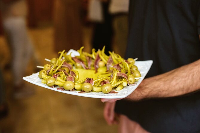Madrid Tapas & Paella Cooking Experience with Local Market Visit - What the strongest parts deliver
