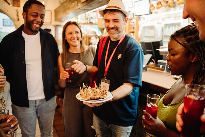Madrid Tapas & Taverns Small Group Food & History Tour - Plaza Mayor and the stories behind the square