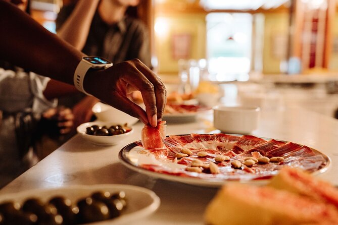 Madrid Tapas & Taverns Small Group Food & History Tour - Puerta del Sol and Madrid’s public life