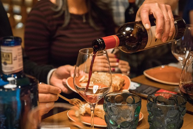 Madrid Tapas & Wine Tasting Walking Tour – Small Group Local Bars - Calle de la Cruz: An Open Kitchen and Hot Plates