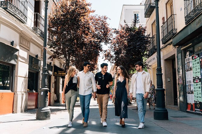 Madrid Tapas & Wine Tour with Rooftop Views and Local Guide - Start at Plaza de San Miguel and enter La Latina