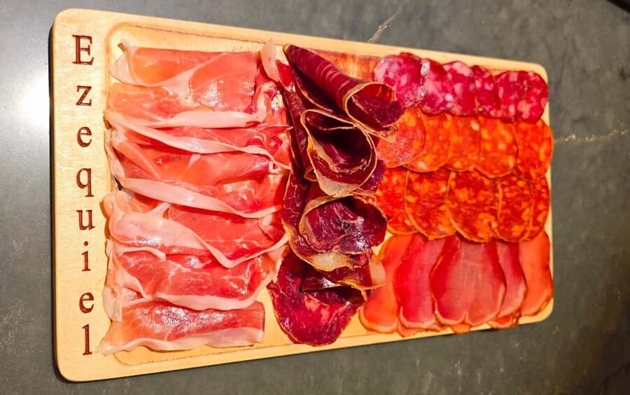 Madrid: Taste typical Spanish tapas, cold cuts, Iberian ham, and wine - Starting at C. de Colón, 13