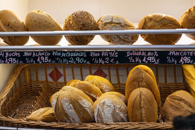 Malaga Food Tour with 12+ Tastings: Tapas, Olive Oil, Ham & More - The guides and the value of local knowledge
