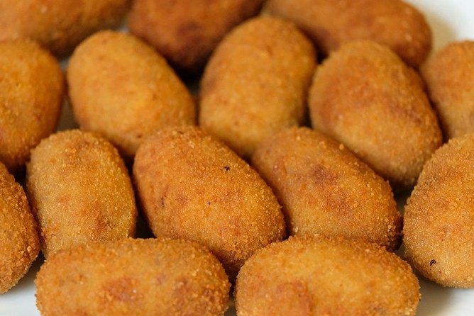 Malaga Market Food Tour: Tapas, Drinks, and Local Flavors - Plaza de la Merced and Andalusian flavors