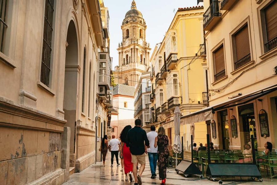 Malaga's tradition and tapas tour with Official Guide - Walking past Larios Street, the cathedral, and Picasso Museum