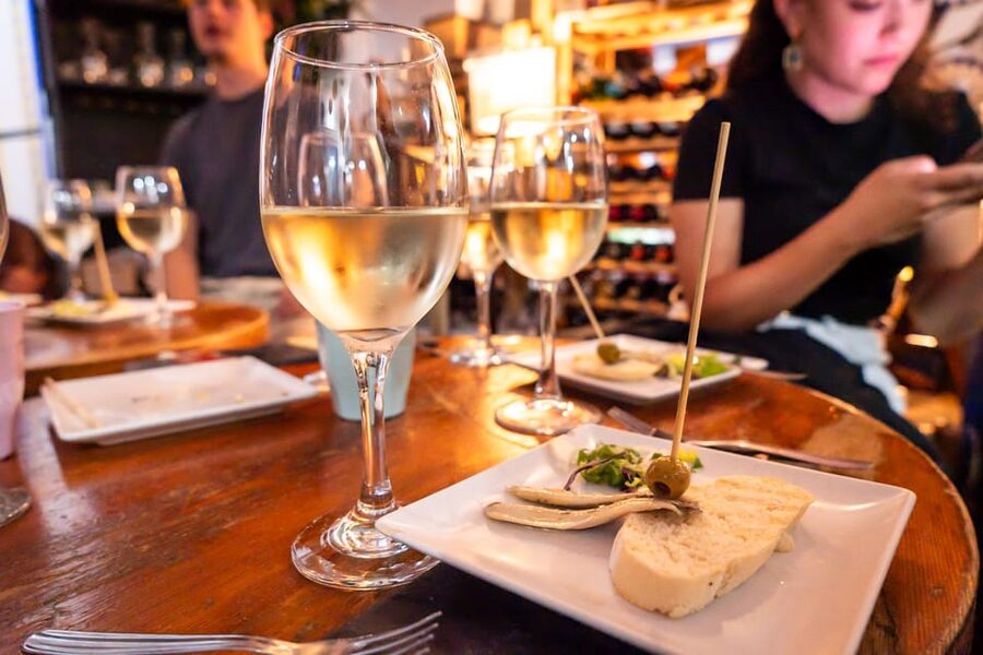 Malaga: Wine and Tapas Tour with Tastings and Drinks - First stop: a traditional tapas bar