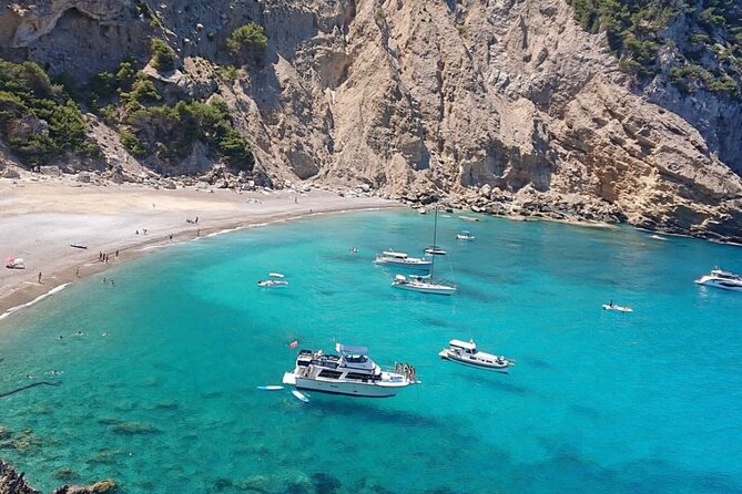 Mallorca Beach & Caves 4hr Boat Trip Drinks, Tapas, SUP & Snorkel - Alcanada Lighthouse and the second water stop
