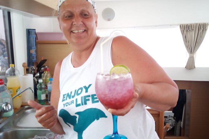 Mallorca Catamaran Small Group Cruise with Tapas 4-hours - Timing, weather, and cancellation details