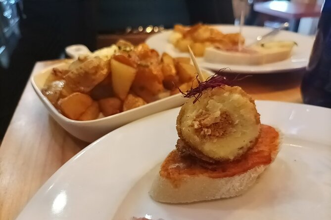 Marbella Food Tour: Tapas, Drinks and Delights with a Local - Plaza de la Victoria adds anchovies and ham croquettes
