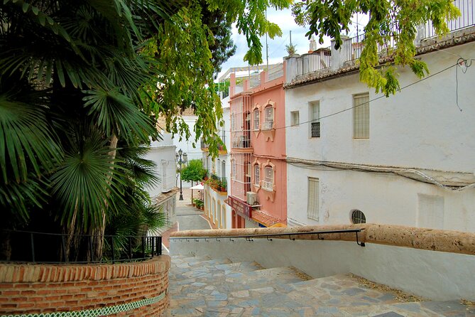Marbella Old Town: Authentic Tapas Food Tour With Local Guide - Old walls and fortress remains add context