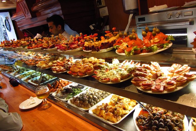 Night Tapas Walking Tour in Barcelona Modernist Area with Small Group and Dinner - What the guides add to the evening