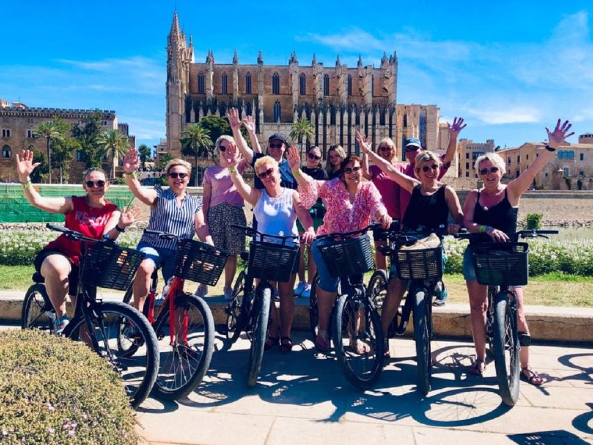 Palma de Mallorca: Guided Bicycle Tour with Tapas & a Drink - Passeig des Born and the city’s grander side