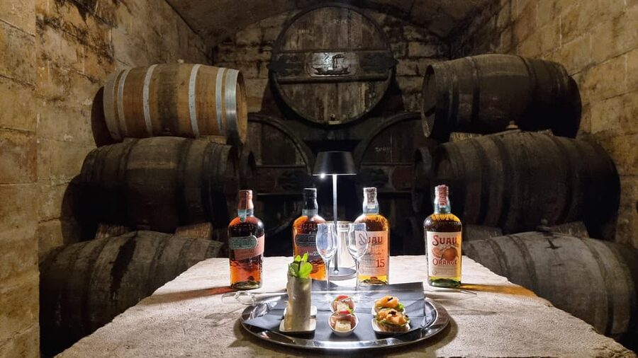 Palma: Distillery Tour with 3 Spirits and Tapas Tasting - Three barrel tastings, from 15 years to 50