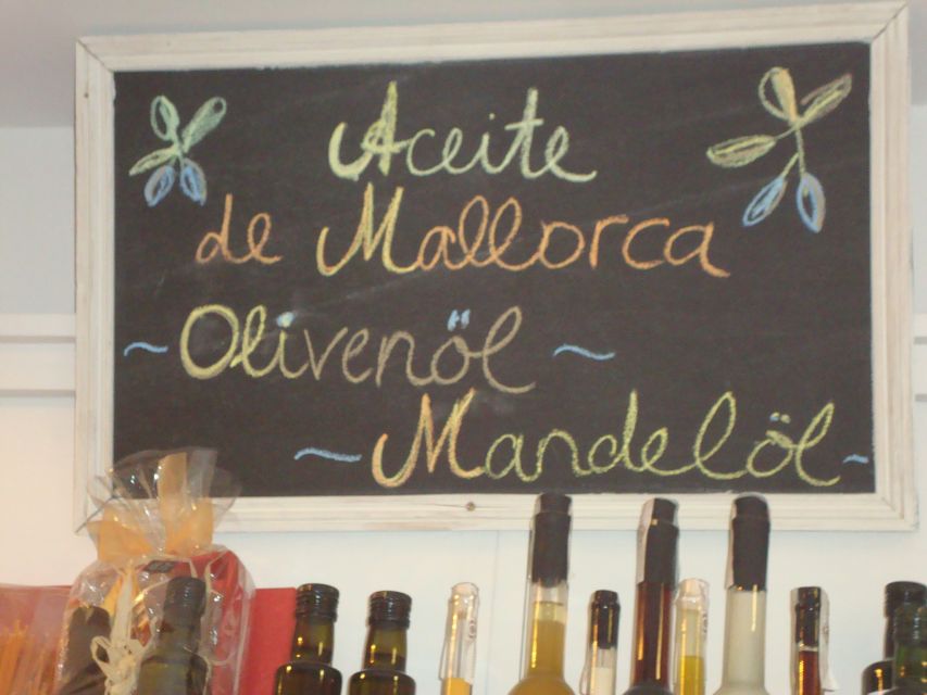 Palma Tour with Wine and Tapas Tasting - Olive oil, ham, cheese, and useful food context
