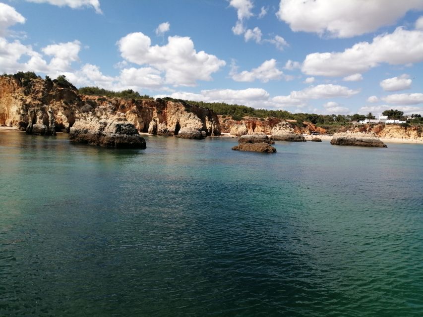 ponta da piedade 2h luxury charter with drinks and tapas - Leaving Lagos Marina at Passeio dos Descobrimentos