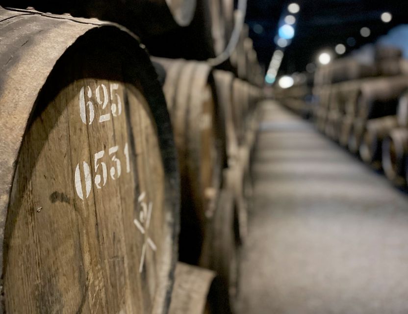Porto: Wine Tasting with Tapas Walking Tour - Five wines and a table of Portuguese tapas