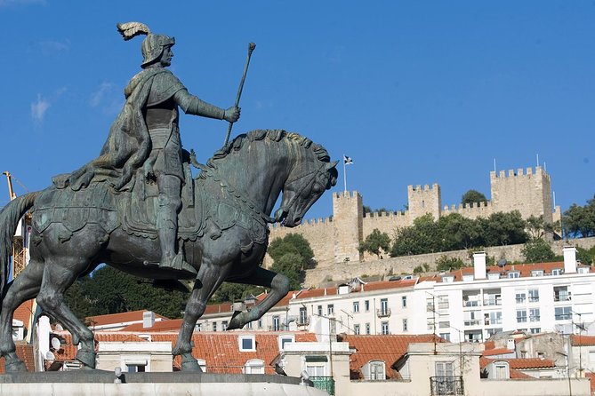 Private Lisbon Walking Tour with Premium Port Wine and Tapas Tasting - Baixa, Rossio, and Restauradores: Lisbon’s downtown introduction