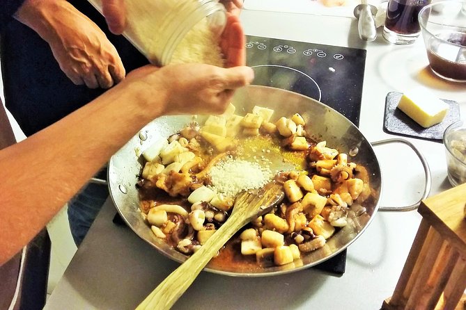 Private Paella class, Tapas, full menu and Sangria workshop - Mixing sangria before the main lesson