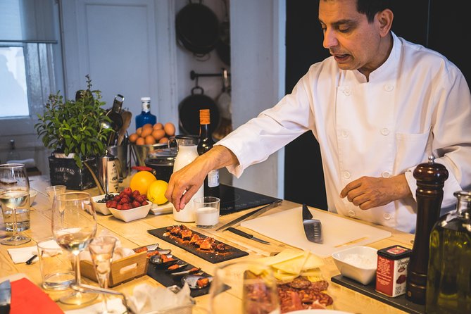 Private Paella class, Tapas, full menu and Sangria workshop - Making seafood paella in small cooking teams