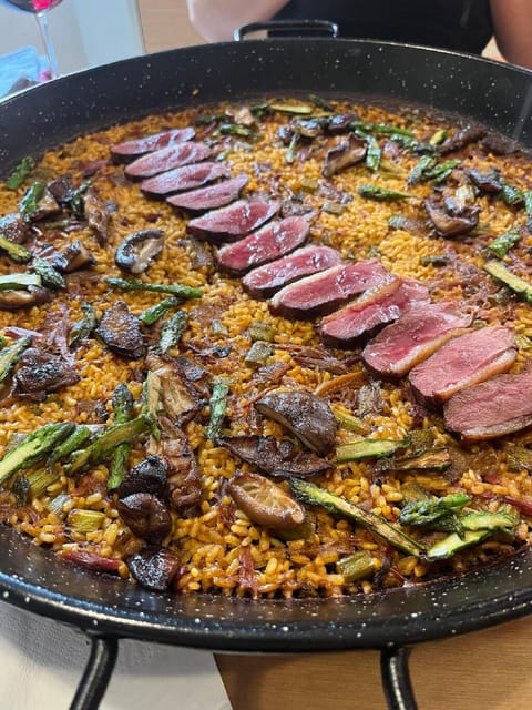Private Paella & Tapas Cooking Class in a Local Chef's Home - A private home kitchen with a skilled local host