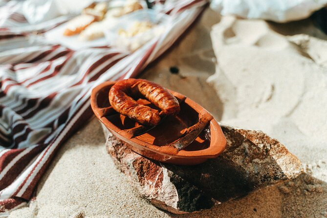 Private Sunset Hike, Tapas & Wine at Secret Beach - Ninety minutes of sunset, tapas, wine, and music