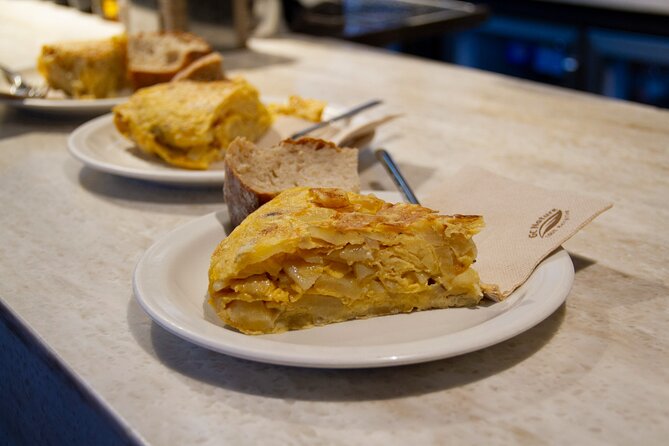 San Sebastian Food & Pintxos Tour with 12 Food & Drinks Tastings - Foie gras, mushrooms, and a sweet finish