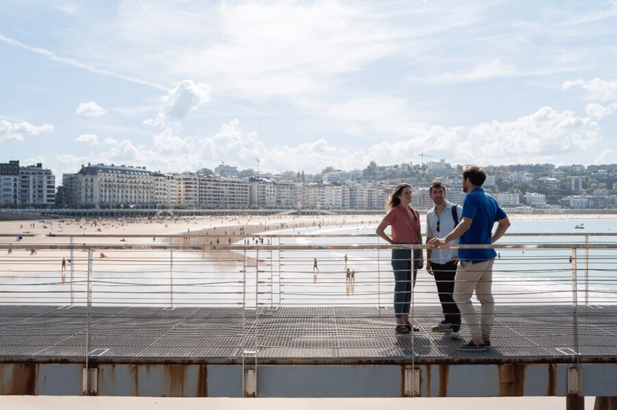 San Sebastian: Walking Tour with Pintxo and Drink - Crossing into the Old Town