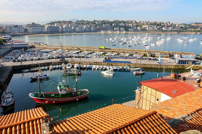San Sebastian walking tour with pintxo and drink option - The hotel, theater, and scars of the past