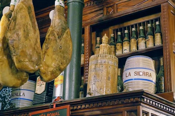 Sevilla Food Tour: Tapas, Wine, History & Traditions - Santa Cruz, family cooking, and a sweet finish