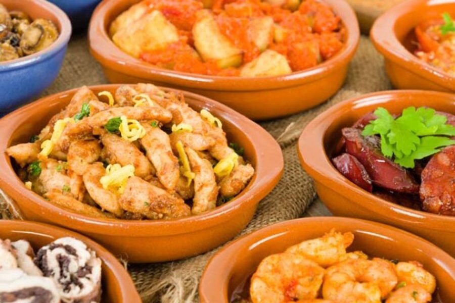 Seville: 3-Hour Tapas Tour by Bike - The tapas stop: useful, tasty, and worth clarifying