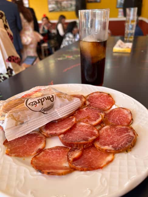 Seville: April Fair Guided Walking Tour with Tapas & Drinks - Timing, language, and cancellation flexibility