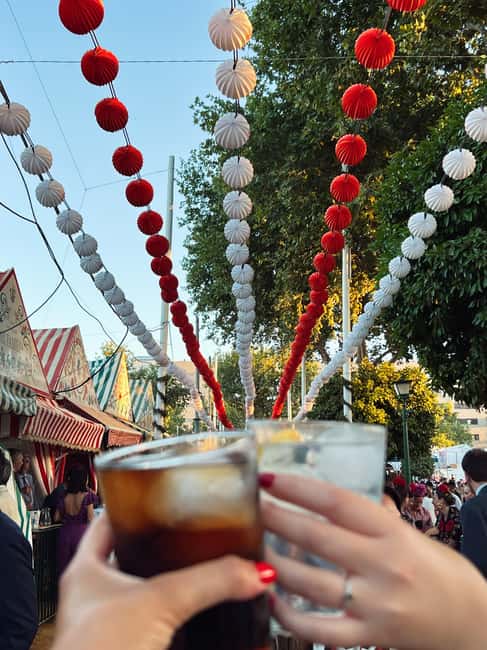 Seville: April Fair Guided Walking Tour with Tapas & Drinks - Horses, carriages, dress, and flamenco