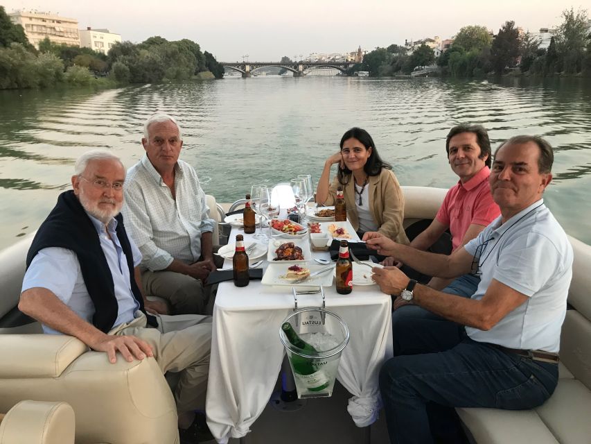 Seville: Exclusive River Boat Tour with Tapas - Guide style, group size, and comfort