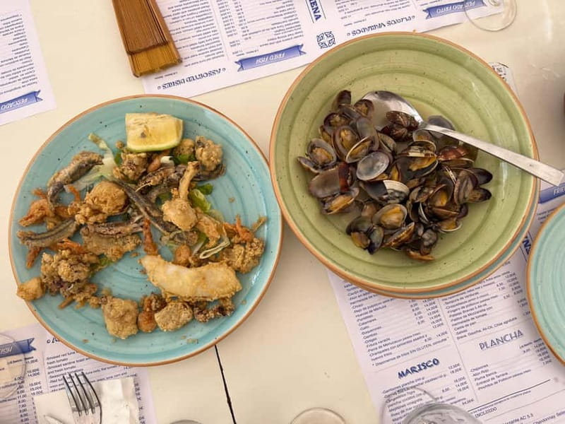 Seville: Secret Food Tour with Tapas and Drinks - Traditional dishes, creative tapas, and dietary needs