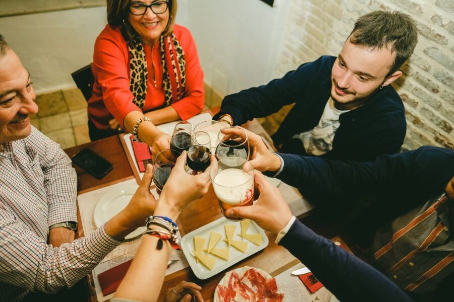 Seville: Small Group Jewish Quarter Tour with Tapas & Drinks - Santa Cruz Square and Murillo Gardens